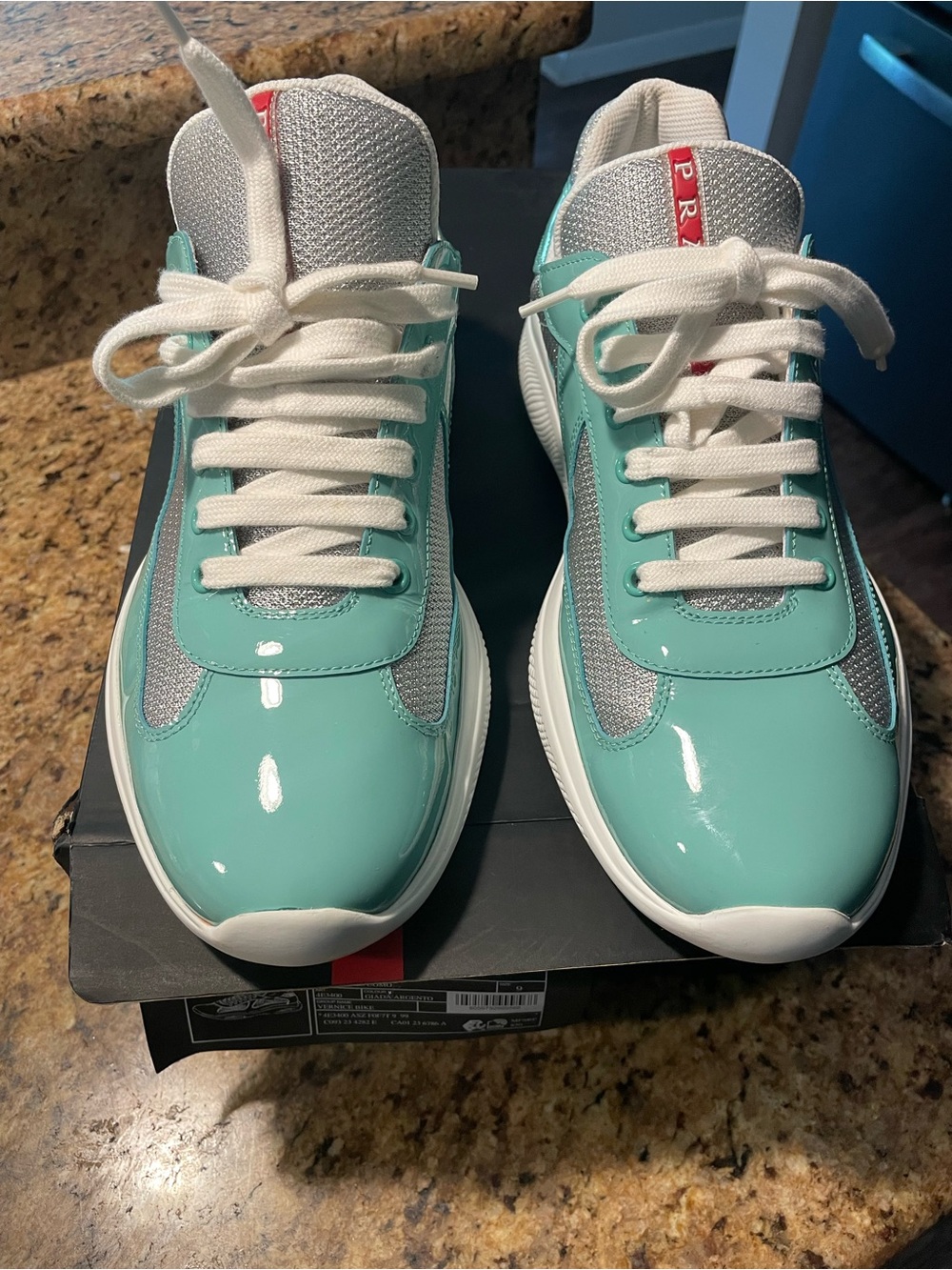 Prada White Leather Low-Top Sneakers with Red Tongue Tab